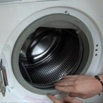 cambiar el puño de una lavadora